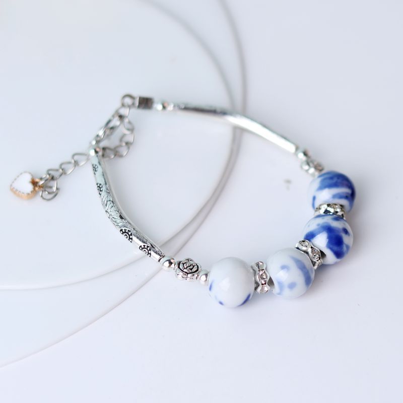 Tubo de curvatura al por mayor cuentas de cerámica pulsera de cuerda hecha a mano